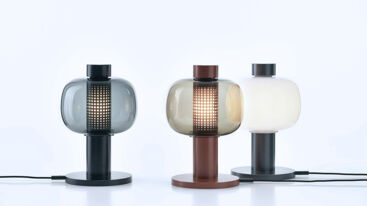 Trio of designer lamps in the style of Japanese paper lanterns used to light the paths leading to shrines