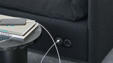 Sofa with integrated power cable system