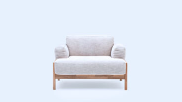 Sofa with ample cushioning, wooden frame, and a low seat height