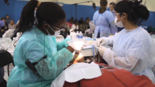 Dental volunteers treat patients