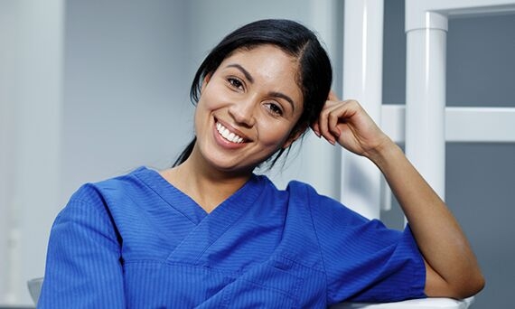 Woman dentist smiling
