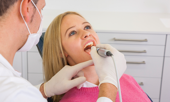 Dentist Using Dental Intraoral Camera