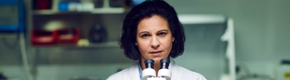 Woman Scientifc researcher in a dental lab