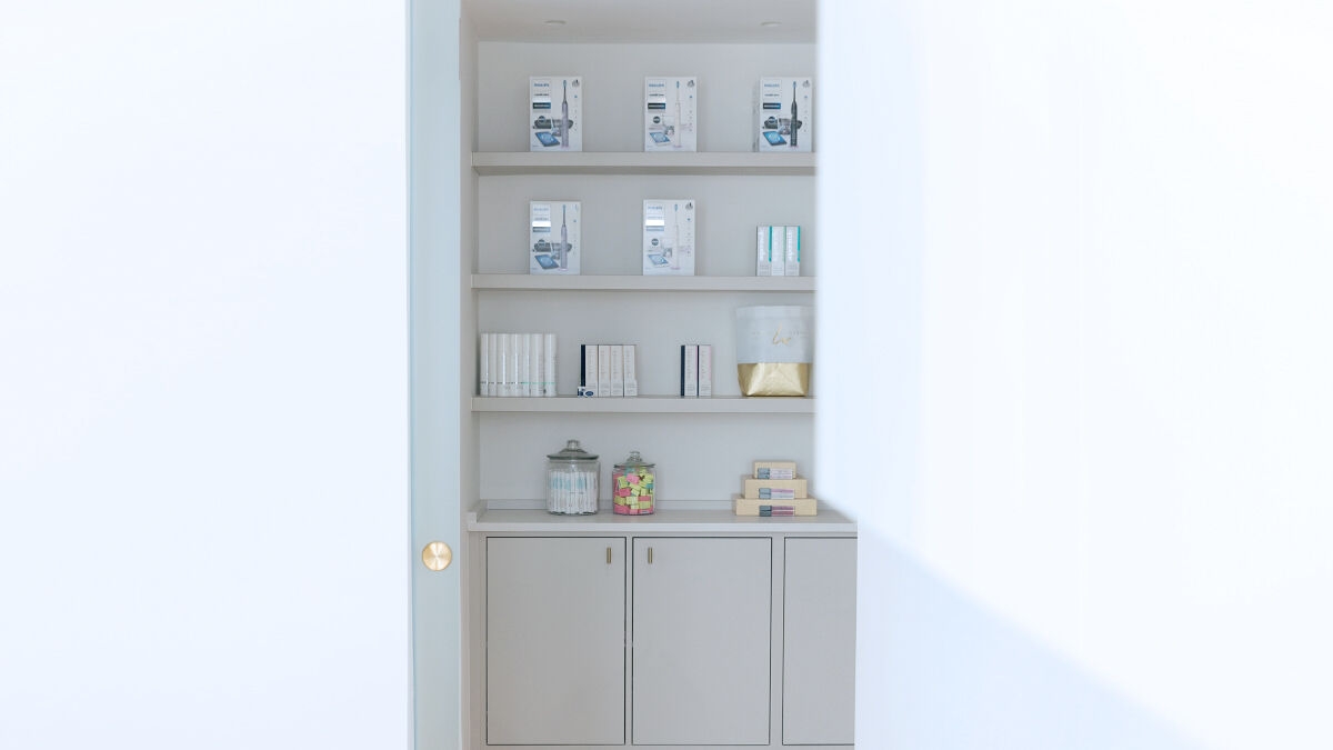 Dental practice, cabinet with items.